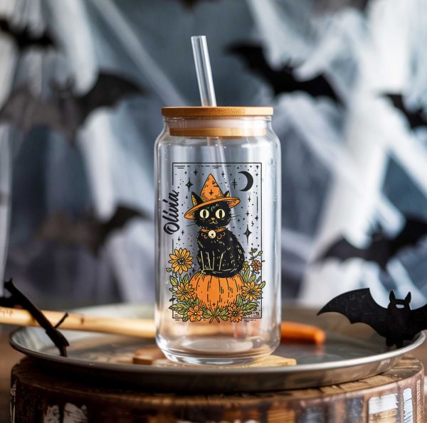Personalized Halloween glass can with black cat on pumpkin, flowers and moon, name in script, bamboo lid and straw