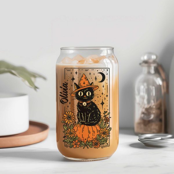 Personalized Halloween glass can with black cat on pumpkin, flowers and moon, name in script, bamboo lid and straw