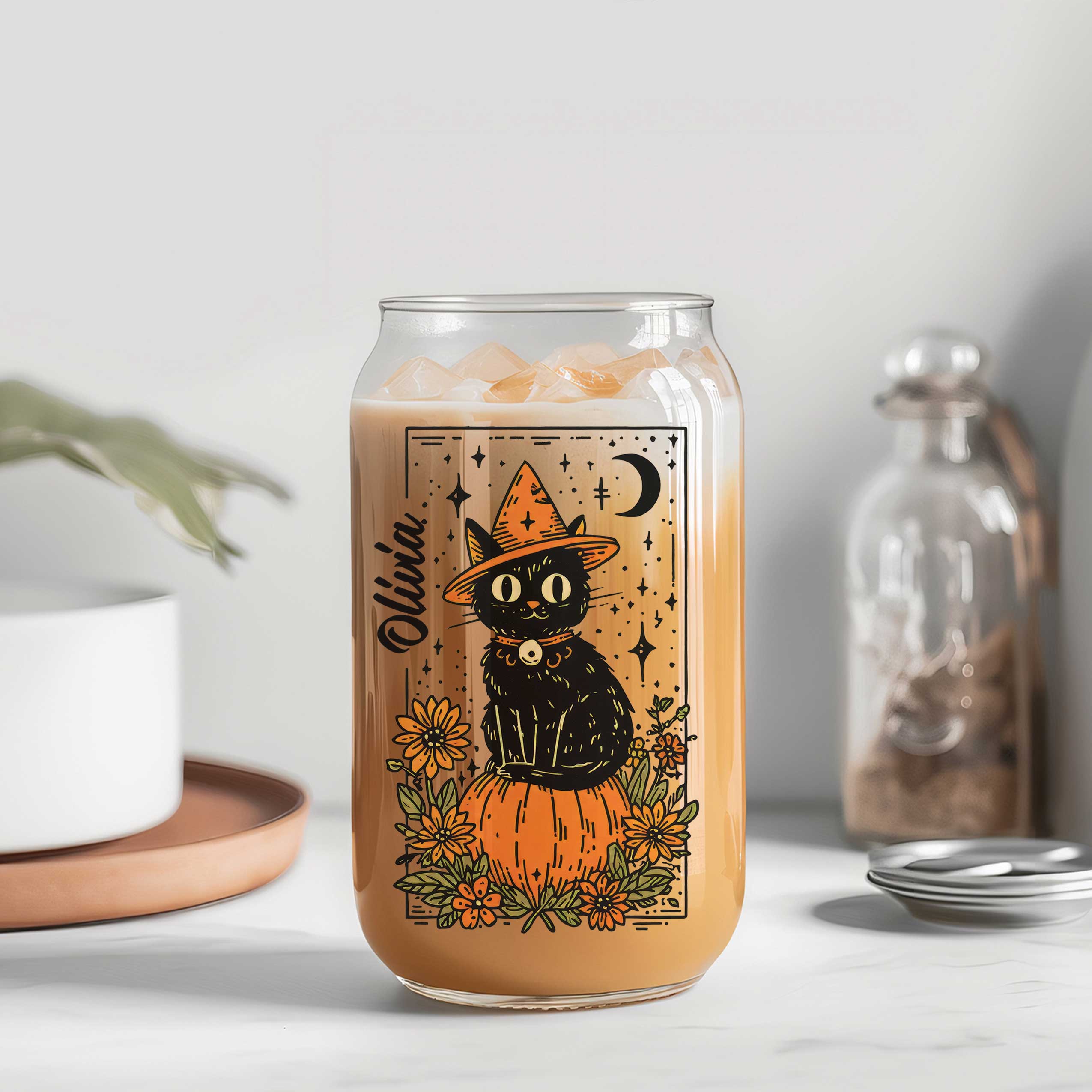 Personalized Halloween glass can with black cat on pumpkin, flowers and moon, name in script, bamboo lid and straw